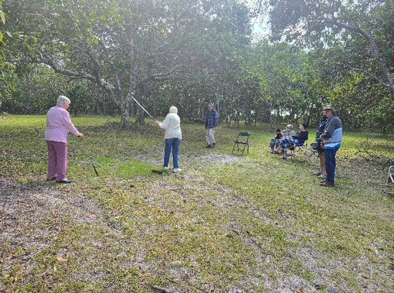 Members playing golf at Broadwater Bush Camp